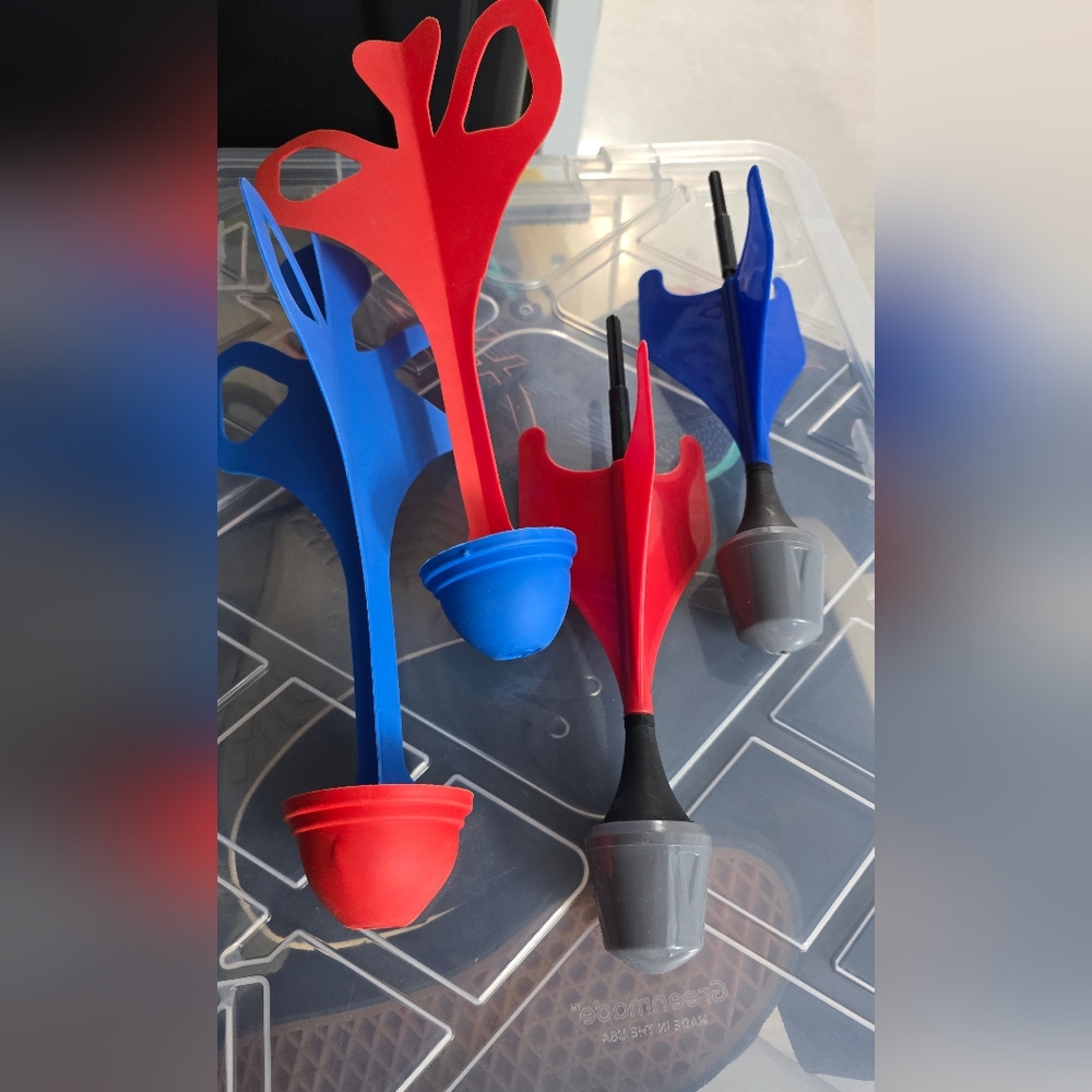 Red and Blue Golf Tees with Gray Base
